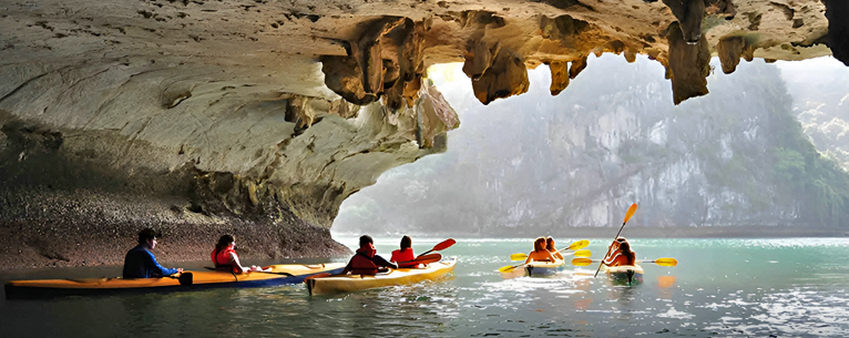 Kayaking To Caves in Halong Bay