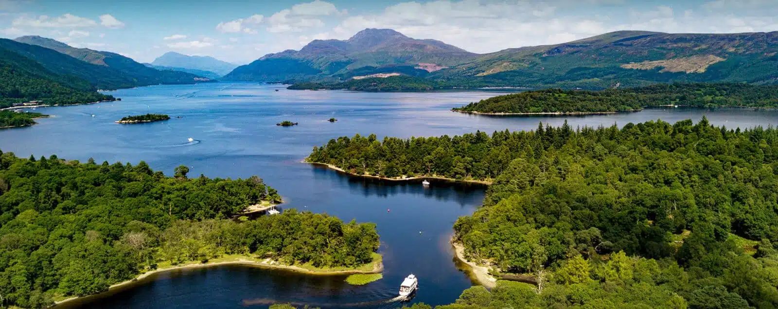 Luxury Scotland and Ireland tour package from Kolkata featuring castles, countryside and coastal views